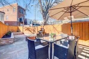 Outdoor dining - Historic H Street Corridor Townhome, Patio + Grill (Washington)