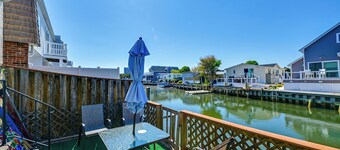 Deck w/ Canal Access: Ocean City Townhome