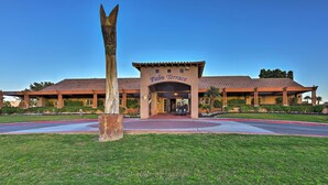 A building with a sign reading "Palm Terrace." - Indio Home w/ Resort Amenities, Near Festivals! (Indio)