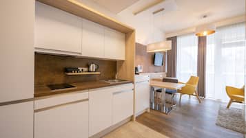 Premium Studio, 1 King Bed, Non Smoking, Balcony (201) | Private kitchen | Full-sized fridge, microwave, stovetop, dishwasher