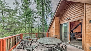 A wooden deck with metal tables and chairs, surrounded by tall trees. - Tree-lined 'polly's Perch' w/ Mountain Views! (Ruidoso)