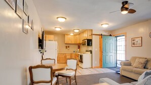A compact living space with a dining area, kitchen, and seating area. - Private Duck Creek Apartment Near Entertainment! (Duck Creek Village)