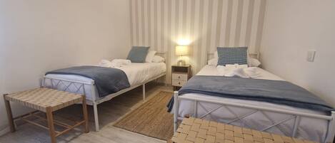 2 habitaciones, tabla de planchar con plancha y wifi gratis