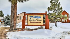 A sign for Lakeview Estates Condominiums surrounded by snow-covered ground and trees. - Pagosa Springs Vacation Rental w/ Boat Dock! (Pagosa Springs)