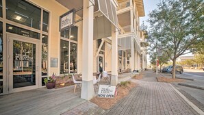 A storefront with a sign indicating it is now open. - Walk to Shore: 'oyster House' Port St Joe Getaway (Port St. Joe)