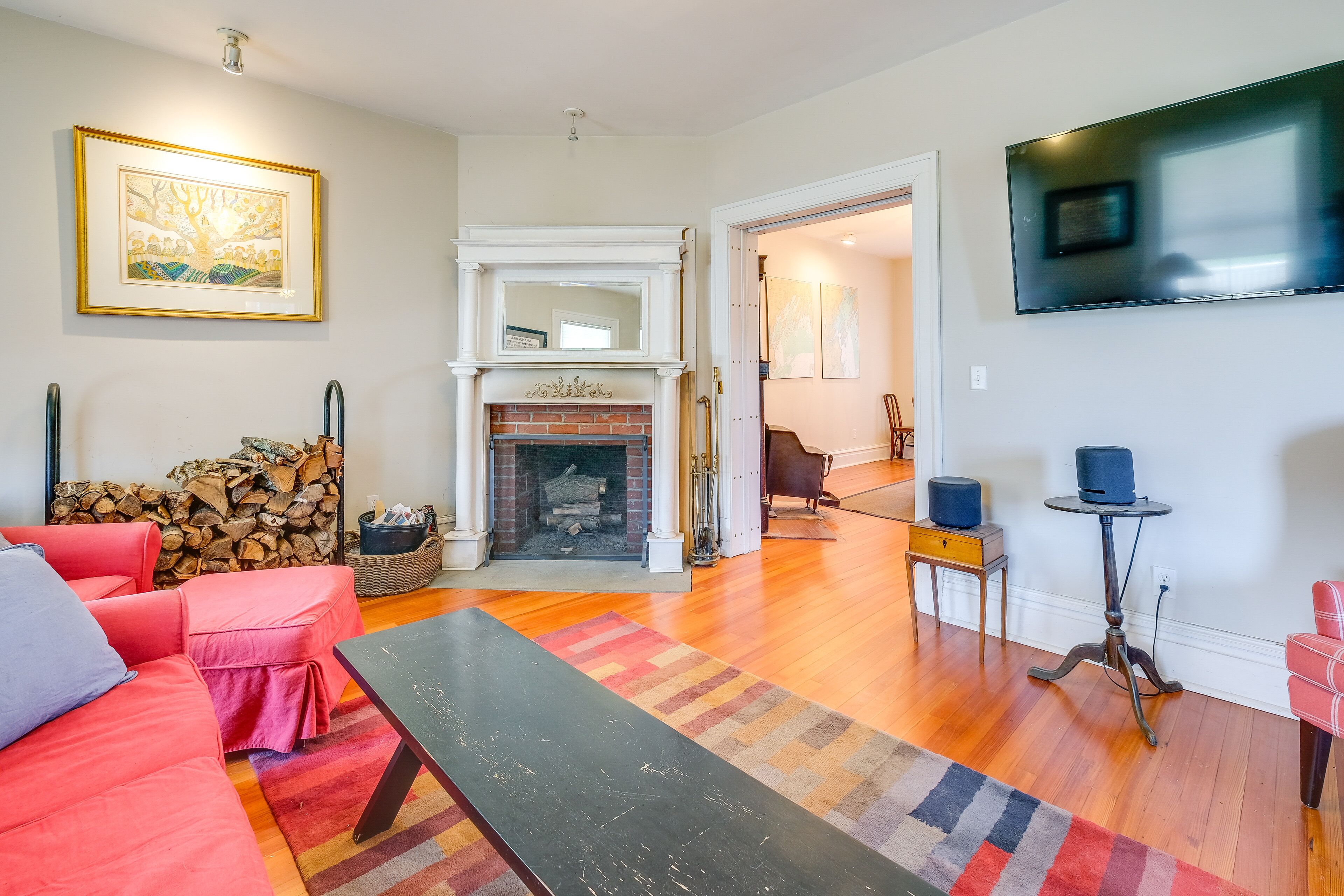 TV, fireplace, books