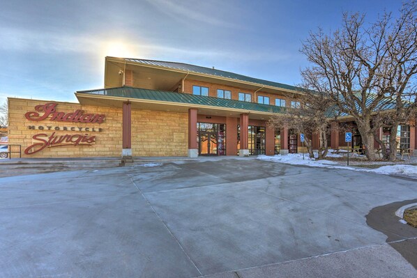 A building with a sign reading "Indian Motorcycle Speedway."