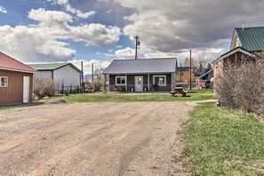 Set amidst a serene rural landscape, this charming two-story building offers a peaceful retreat.
