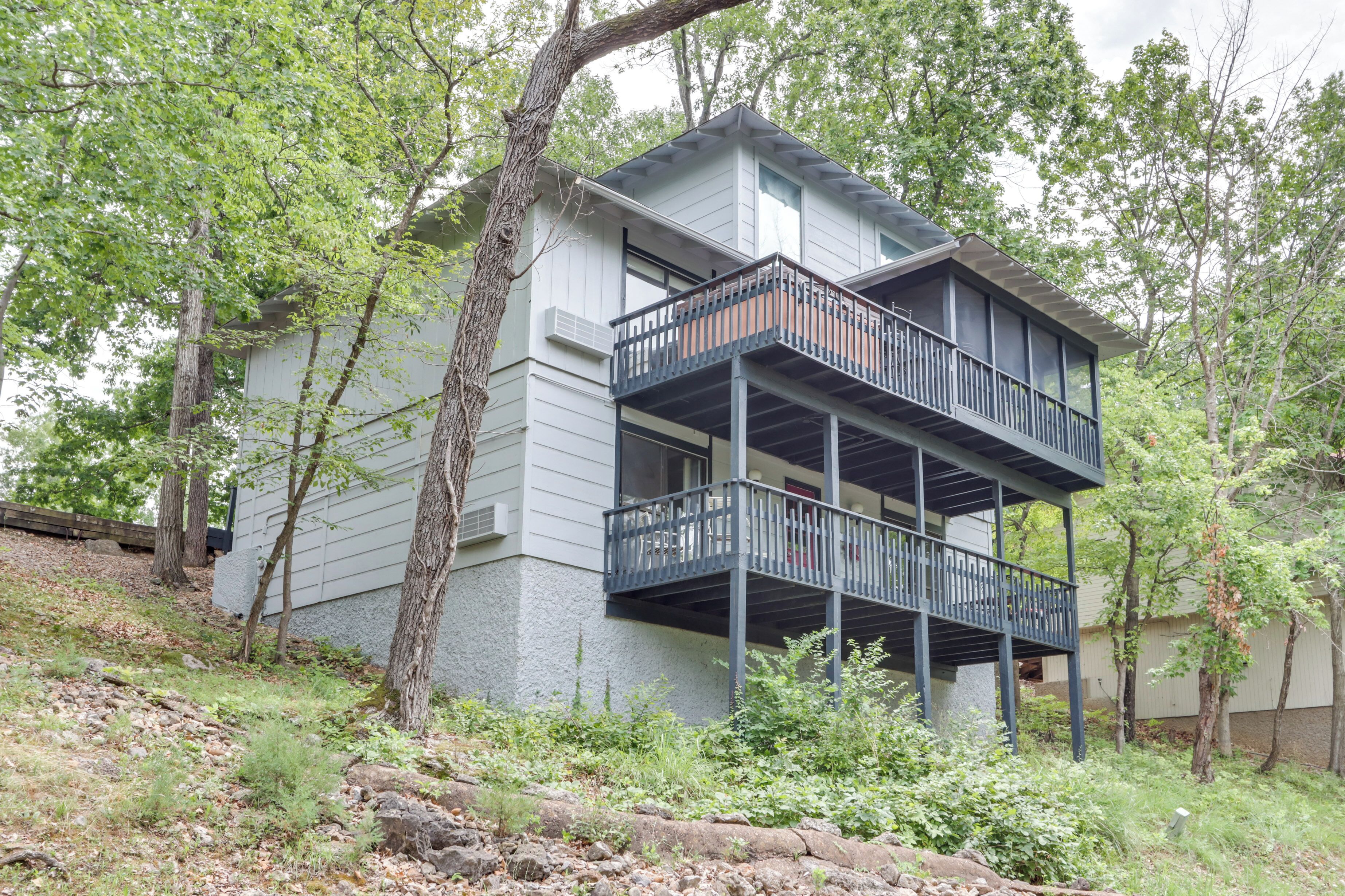 A two-story building with a balcony on the upper level.