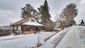 A residential house with a snow-covered roof and a driveway. - Mtn-view Home w/ Deck, 2 Mi to Mickelson Trail! (Lead)