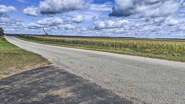 A rural road with a clear sky and clouds. - Arkdale Studio Cabin w/ On-site ATV Trails! (Arkdale)