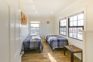 2 bedrooms, laptop workspace, iron/ironing board, free cribs/infant beds