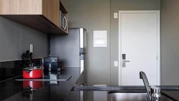 Basic Apartment | Private kitchen | Coffee/tea maker, full-size fridge, microwave, stovetop