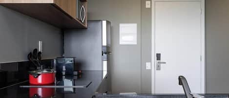 Basic Apartment | Private kitchen | Coffee/tea maker, full-sized fridge, microwave, stovetop