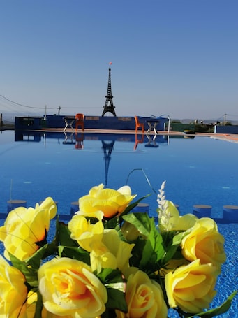 Outdoor pool. Auberge Thala Garden Avec Grande Piscine et Grande Terrasse