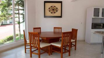 Family Cabin, Multiple Beds | Living area | Flat-screen TV