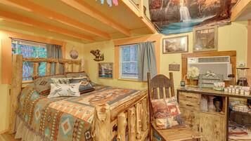 Laptop workspace, bed sheets