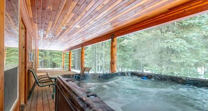 REMOTE CABIN WITH HOT TUB, MOVIE THEATER AND HUGE COVERED DECK WITH FIRE TABLE