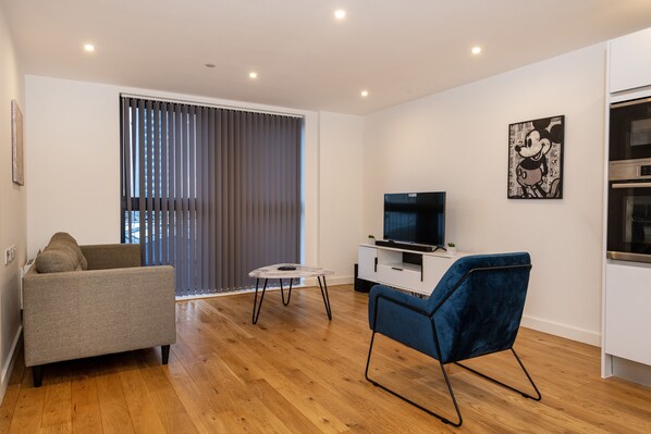 Appartement, 1 grand lit | Coin séjour
