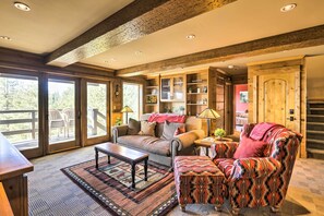 TV, fireplace, books