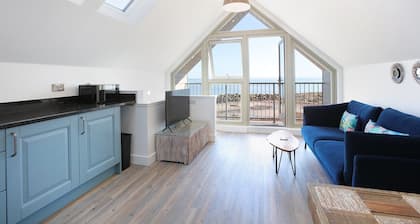 Experience modern coastal living at its finest in this unique one-bedroom property. Sleeps 2.