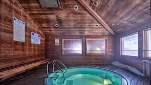 A wooden cabin with a swimming pool, wooden walls, and a ceiling with recessed lighting. - Brian Head Ski-in/ski-out Condo w/ Resort Perks! (Brian Head)