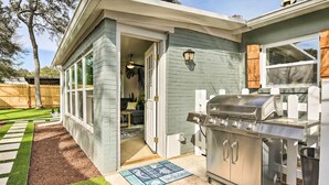 A patio with a grill, a welcome mat, and a view of the backyard. - Emerald Coast Vacation Rental: 1 Mi to Beach (Shalimar)