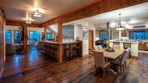 A spacious kitchen with a large island, wooden beams, and a bar area. - 2 Blocks to Lake Tahoe! Group Gem w/ Hot Tub (Incline Village)