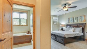 A bedroom with a bed, a ceiling fan, and a window. - < 1 Mi to Hot Spring: Condo in Pagosa Springs! (Pagosa Springs)