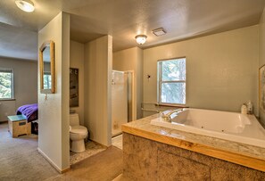 Enjoy a relaxing soak in the bathtub and unwind with a refreshing shower.