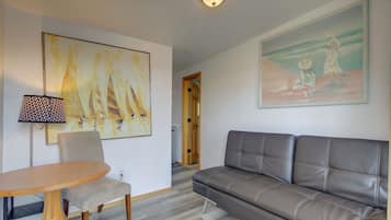 Standard Room, 1 King Bed with Sofa bed | Living area | 32-inch flat-screen TV with cable channels, TV, DVD player