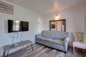 Televisión de pantalla plana de 32 pulgadas con canales por cable