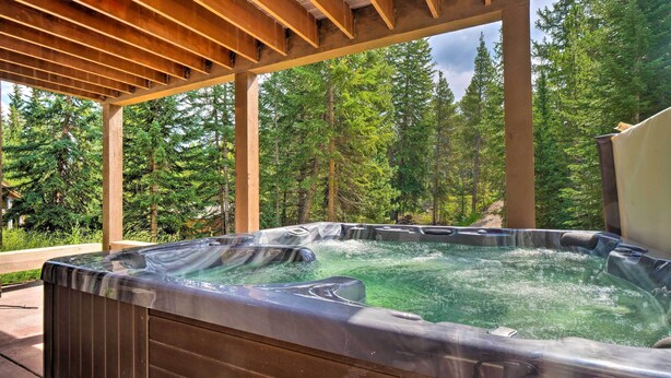 A hot tub under a wooden pergola with a forest view. - 3 Mi to Ski Resort: Hot Tub Haven in Breckenridge! (Breckenridge)