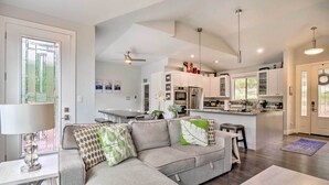 A modern kitchen with white cabinets, a central island, and stainless steel appliances. - 3 Mi to Ski Resort: Hot Tub Haven in Breckenridge! (Breckenridge)