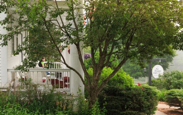 Escape to a serene garden oasis at Rabbit Hill Inn, where lush greenery and a tranquil atmosphere await.