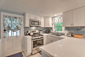 Microwave, oven, stovetop, dishwasher - Renovated Cape Cod Home: Walk to Beach & Downtown! (East Falmouth)