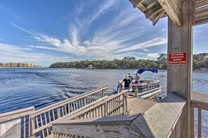 A wooden dock with a sign prohibiting fishing from the dock during boating hours. - 30A Retreat w/ Patio & Resort Amenities! (Santa Rosa Beach)