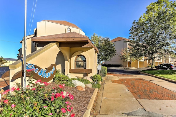 A building with a sign reading "The Shore." - Waterfront Gem w/ Beautiful Lake Views & Balcony (Port Clinton)