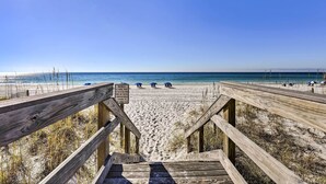 A wooden boardwalk leading to a beach with clear skies. - 'paradise at Dune Pointe' Condo w/ Beach View (Fort Walton Beach)