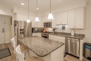 Fridge, microwave, oven, stovetop - Downtown Dewey Beach Condo w/ Pool Garage Parking (Dewey Beach)