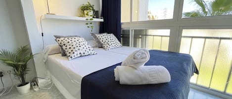 1 dormitorio, tabla de planchar con plancha, cuna de viaje y wifi gratis