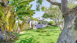 A house with a sign reading "House is Nice." - Victorian Carpinteria Apartment < 1 Mi to Beach! (Carpinteria)