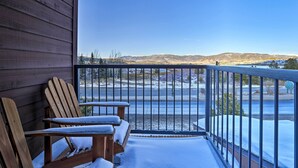 A wooden deck with two chairs and a bench, overlooking a snowy landscape and mountains. - Walk to Main Street: Frisco Townhome w/ Decks (Frisco)