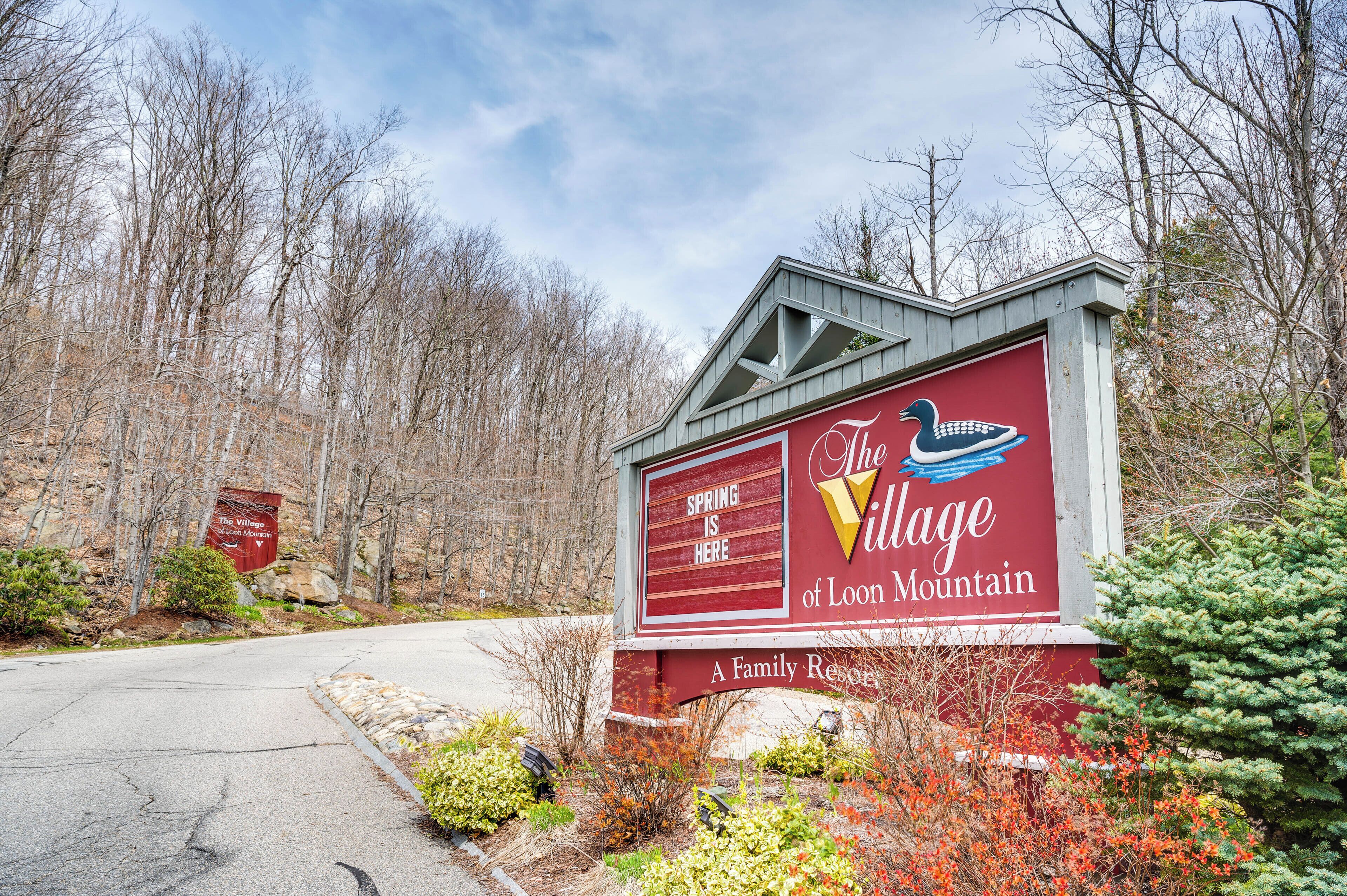 A sign for The Village of Loon Mountain, a family resort.