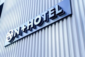 A hotel sign with a modern design and the word "HOTEL" prominently displayed. - Nplus hotel akihabara (Tokyo)