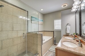 A modern bathroom with a glass-enclosed shower, a bathtub, and two sinks. - 'bailey's Beach House Retreat' w/ Game Room! (Panama City Beach)