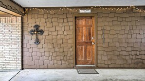 A wooden door with a sign above it reading "EAGLES NEST". - Studio w/ Pool - 13 Mi to Downtown Dallas! (Dallas)