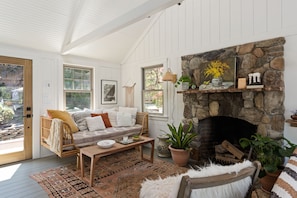 Smart TV, fireplace, books