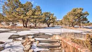 A natural landscape with trees, a stone pathway, and a snow-covered ground. - Buena Vista Oasis w/ Mtn Views, 3 Mi to Dtwn! (Buena Vista)