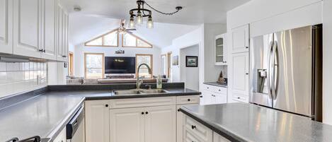 House (5 Bedrooms) | Private kitchen | Highchair, paper towels